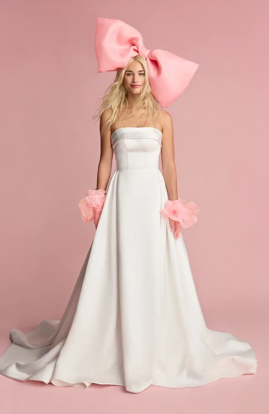 Model wearing a white gown by Idan Cohen