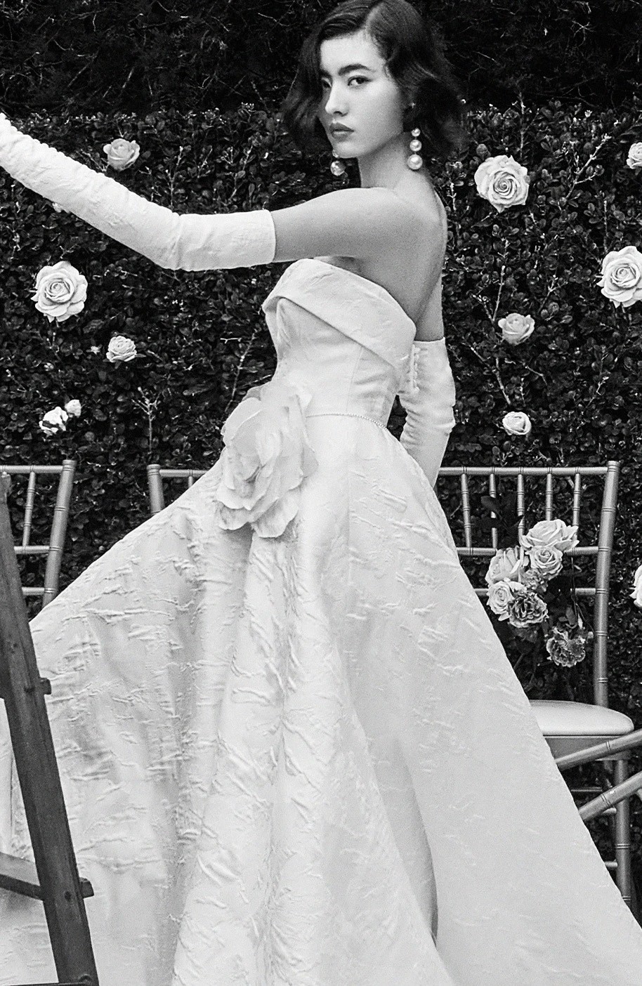 Model wearing a white gown - black and white image