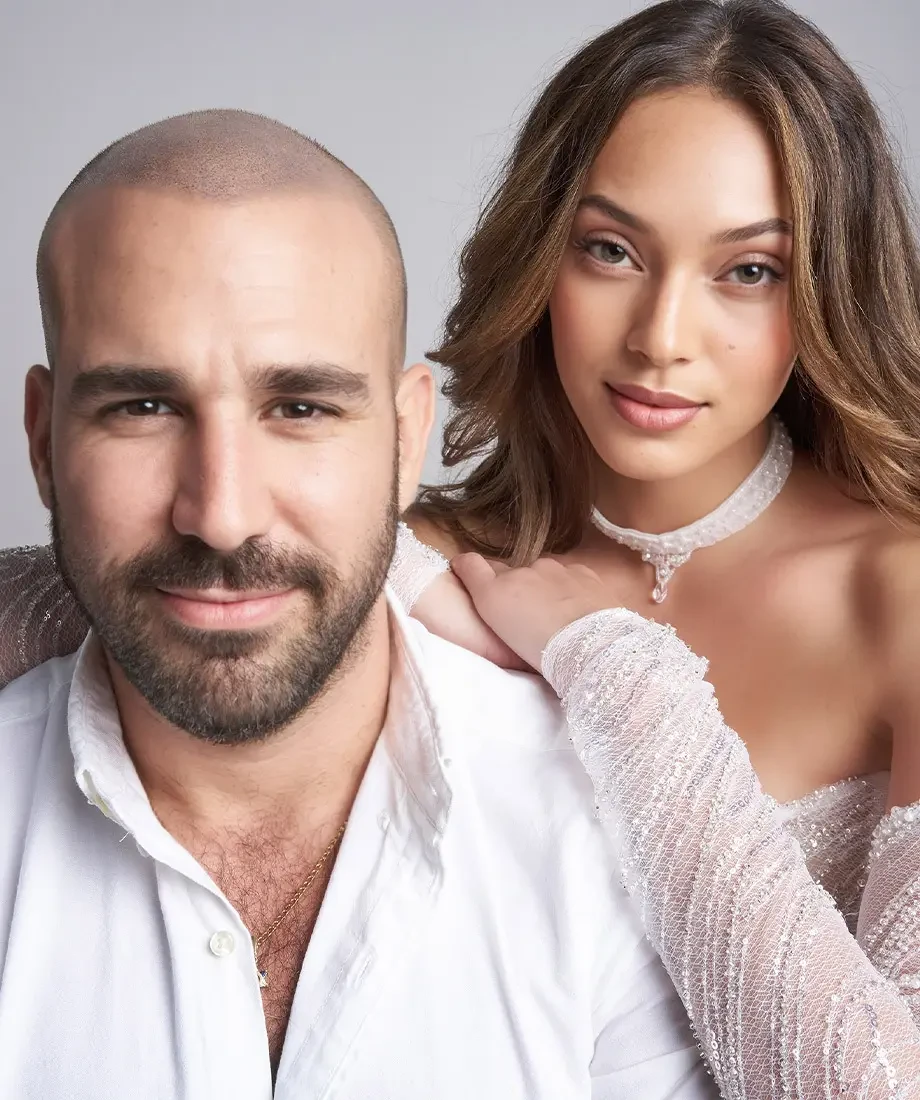 Photo of Idan Cohen and a model.